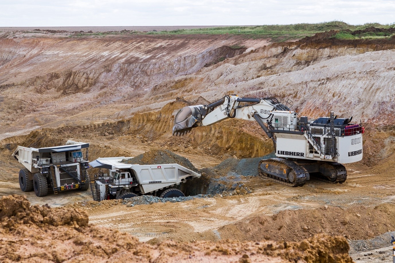 Liebherr R9800 Excavator and dump trucks for mining