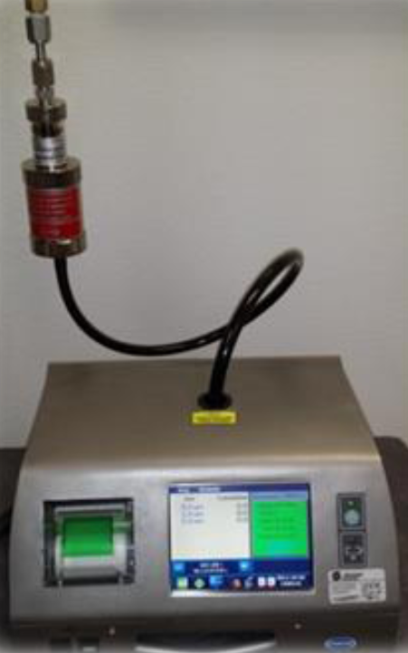 The MET ONE HPD connected to a MET ONE 3400 series counter and a gas line