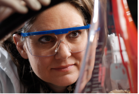 Scientist using Erlenmeyer Flask