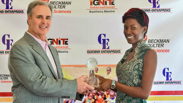 Evah Namakula Receiving Cares Award