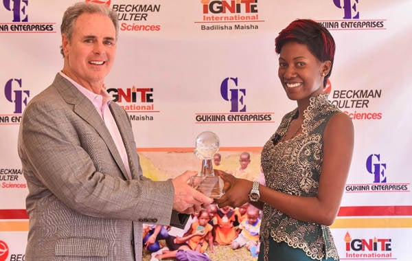 Evah Namakula Receiving Cares Award