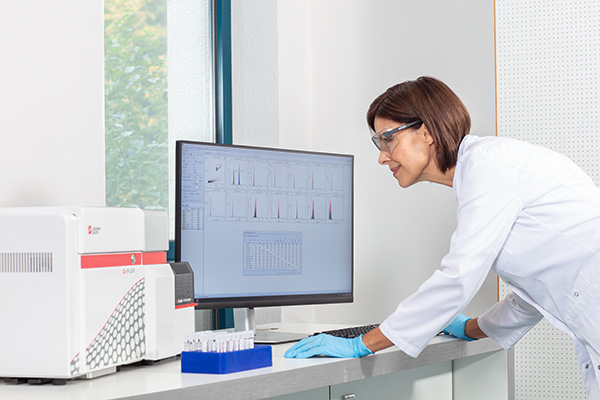 Lab technician working on DxFLEX