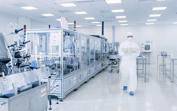 individual in cleanroom manufacturing